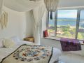 qin-chen-looks-at-the-sea-outside-guesthouse