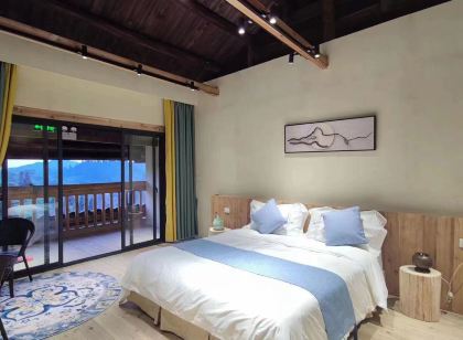 三江稀境月也民宿