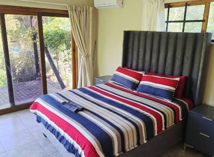 Serene 1-Bedroom Apartment with Garden & Shared Pool