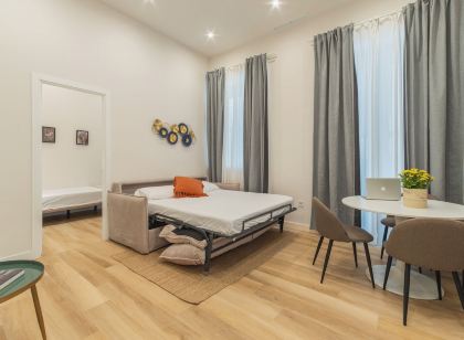 Qe Apartments