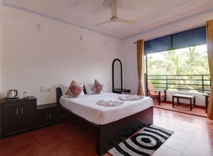 Hotel Pleasure Inn Near Turtle Beach Morjim Manage by ld Group of Hospitality