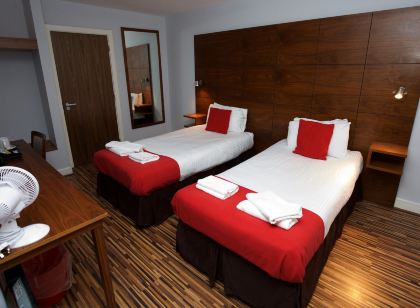 Cocoon @ International Inn + Apartments