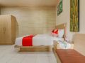 oyo-2581-ketut-smile