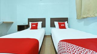 oyo-90559-ummul-motel-c-mart