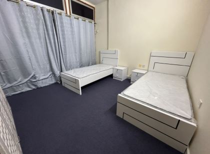 Female sharing room in city center