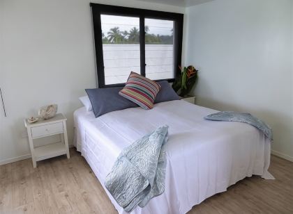 Vaima Beach Retreat- Modern Air Conditioned Apartment /Condo Steps to the Beach!