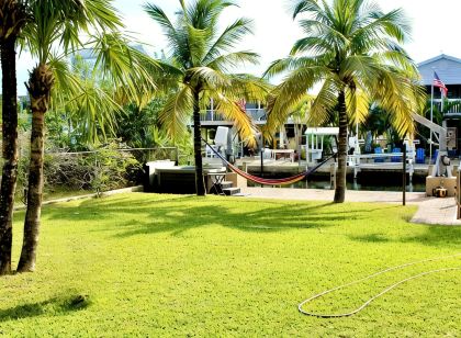 Tropical 5BR Paradise, Private Pool, Hot Tub, Canal Access – Sleeps 12