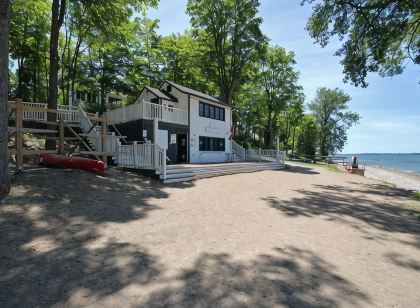 Family Resort Cottage Near Sandbanks | Pools, Lake Access, A/C & Screened Porch