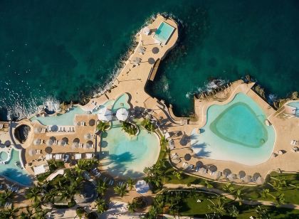 Cozy Apartment with 24/7 pool - 5-10 min walk to Beach, Clubs, activities!