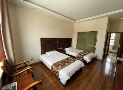 Luqu Xinda Business Hotel