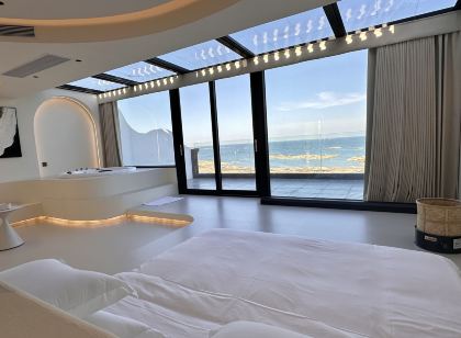 塔影汐岸設計飯店(石獅黃金海岸紅塔灣店)