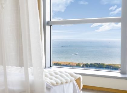 Chushi Scenic Apartment (Weihai International Coastal Baths Huoju 8th Street)