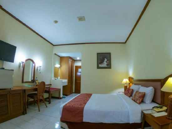 Surya Pesona Beach Hotel Rooms