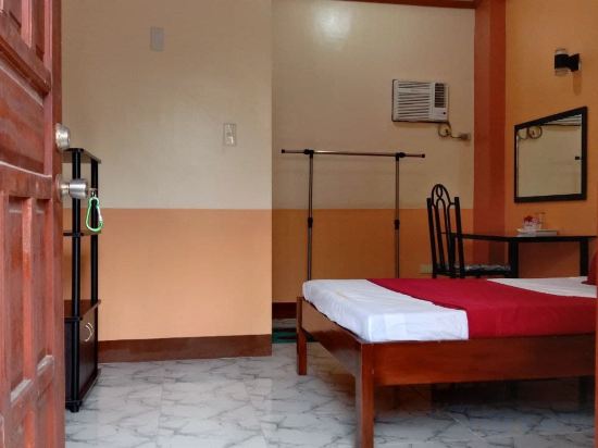 RedDoorz @ Solid Rock Guest House Baler - Tap to explore photos