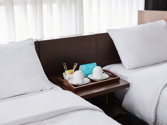 Felix by STX Hotel & Suite - Tap to explore photos
