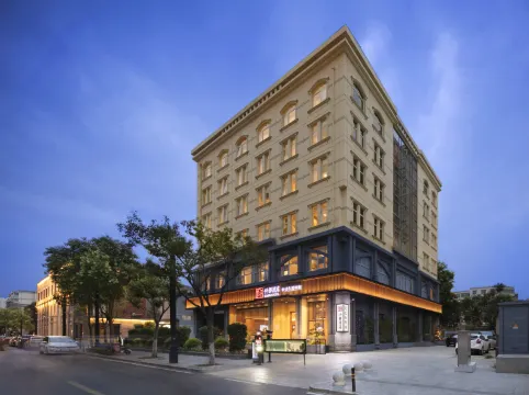 Qianna Hotel (Zhengzhou Erqi Square Dennis David City)