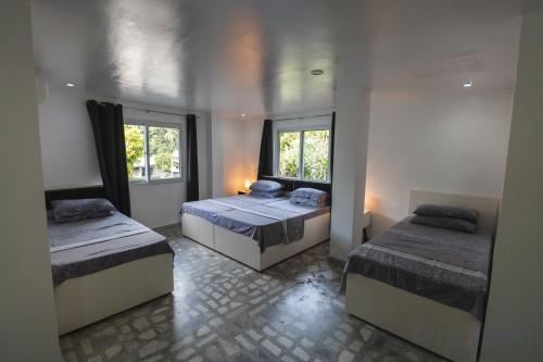 The Three P Beach Resort & Dive Center - Tap to explore photos