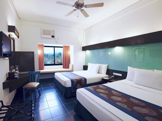 Microtel by Wyndham Puerto Princesa - Tap to explore photos