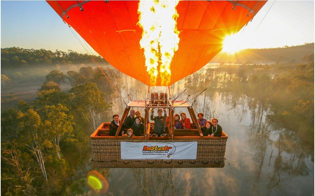 Gold Coast sunrise hot air balloon ride with hotel pickup, breakfast, and digital photos included