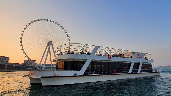 Crociera di lusso al tramonto e cena a Dubai (90 minuti) su barca di vetro con buffet internazionale e musica dal vivo