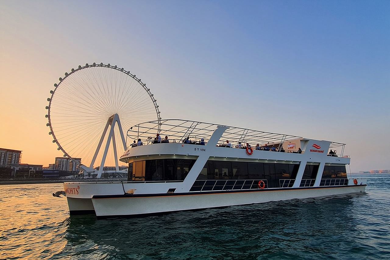 Luxury Dubai Sunset & Dinner Cruise (90min) on Glass Boat with International Buffet & Live Music