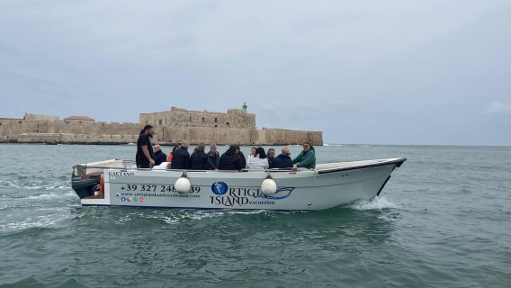 SIRACUSA - CROCIERA IN BARCA DI 90 MINUTI GROTTE DELL'ISOLA + SNORKELING + PROSECCO