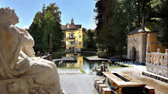 Boat trip to Hellbrunn Palace with trick fountain and London double-decker bus
