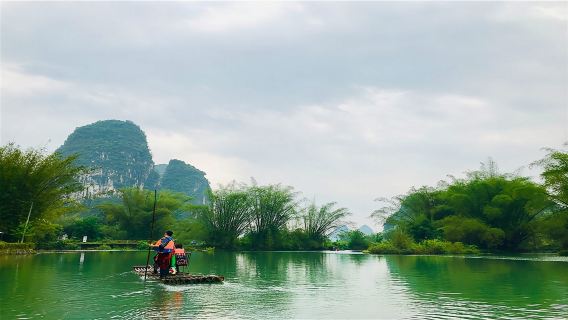 Yangshuo 1-day Private Tour: Shiwai Taoyuan + Xianggong Mountain + Yulong River Rafting + West Street