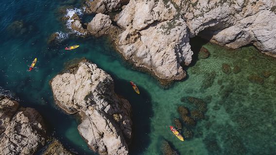 Kayak and snorkel in Tossa de Mar with three course meal