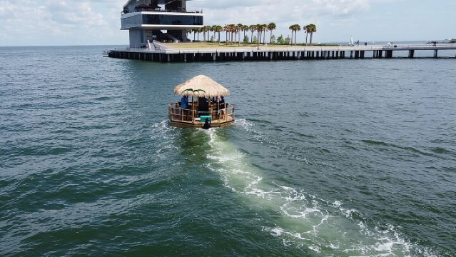 Tiki Boat - St. Pete Pier - The Only Authentic Floating Tiki Bar