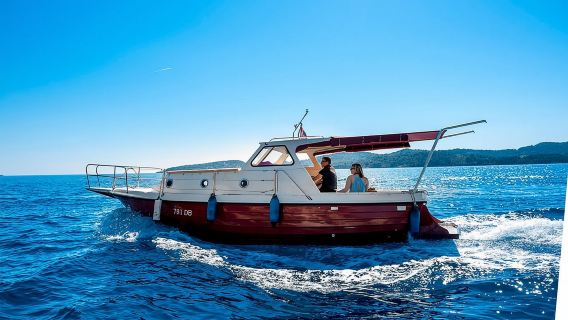 Private boat tour- explore the islands, find hidden caves and try snorkelling