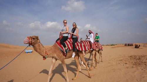 Red Dunes Safari by Quad Bike, Camel Ride, Sandboarding and BBQ at Al Khayma Camp Day Tours 7