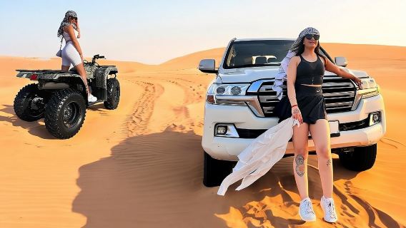 Desert Safari Dubai Tour with Dune Bashing, Camel Ride, & BBQ