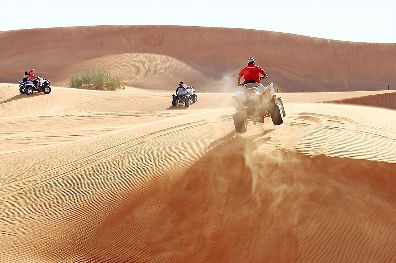 Adventure Quad Bike Safari, Camel Ride & Sandboarding