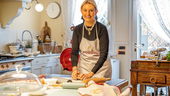 Dining experience at a local's home in Pisa with cooking demo