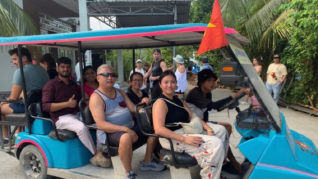 สัมผัสประสบการณ์แท้จริงที่สามเหลี่ยมปากแม่น้ำโขง: ทัวร์รถตุ๊กตุ๊ก เรือพาย และปั่นจักรยาน