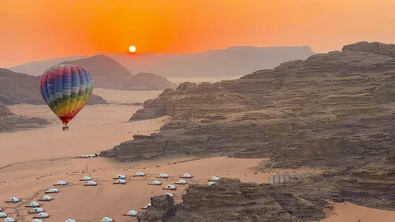 Jordan travel Wadi Rum desert sunrise hot air balloon ride high altitude exploration desert panorama