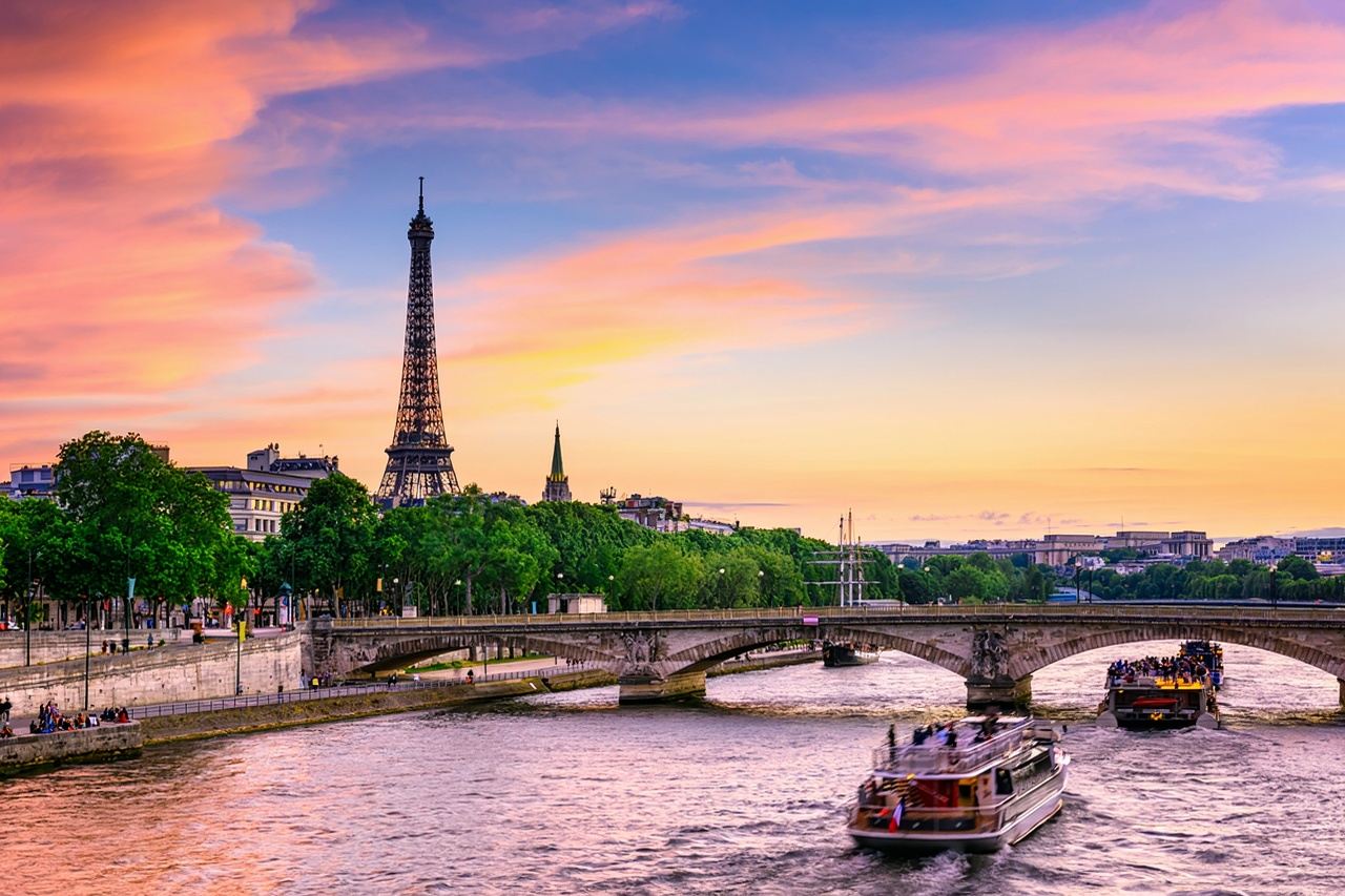 Seine River cruise on Bateaux Parisiens glass-top boat with optional lunch or dinner