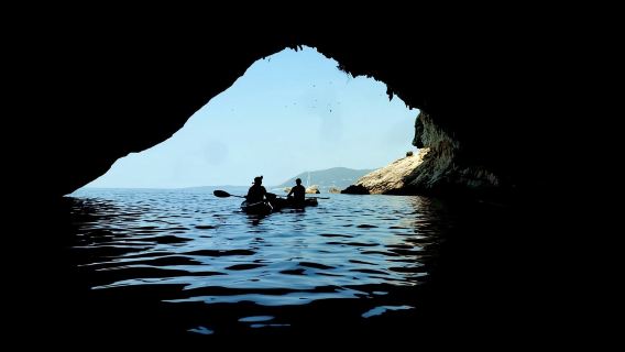 From Agios Ioannis Beach: Kayak Day Trip to Papanikolis Cave