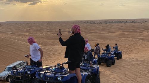 Premium Dubai Red Dunes Quad Bike Tour, Sandboard, Camel & BBQ  Day Tours 2