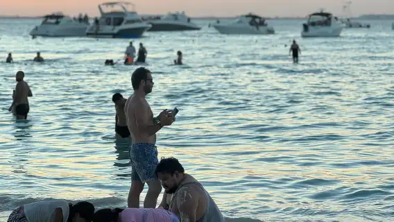 Sunset Sailing to Isla Mujeres with Cancún Transfer