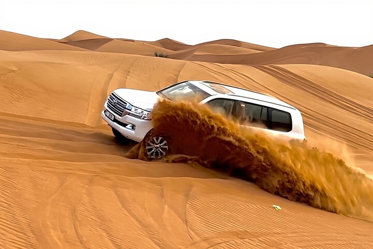 Dubai Evening Desert Safari With BBQ & Camel Ride