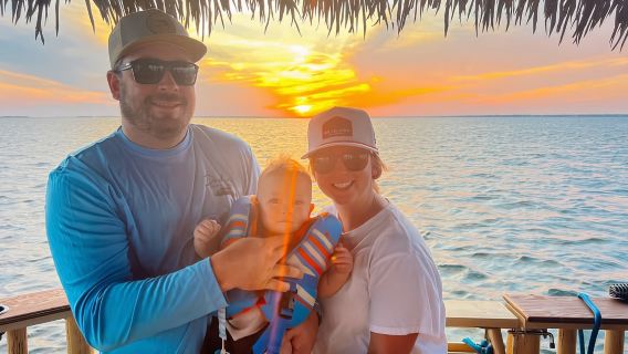 Destin: Sunset Crab Island & Dolphin Tour on Tiki Vessel
