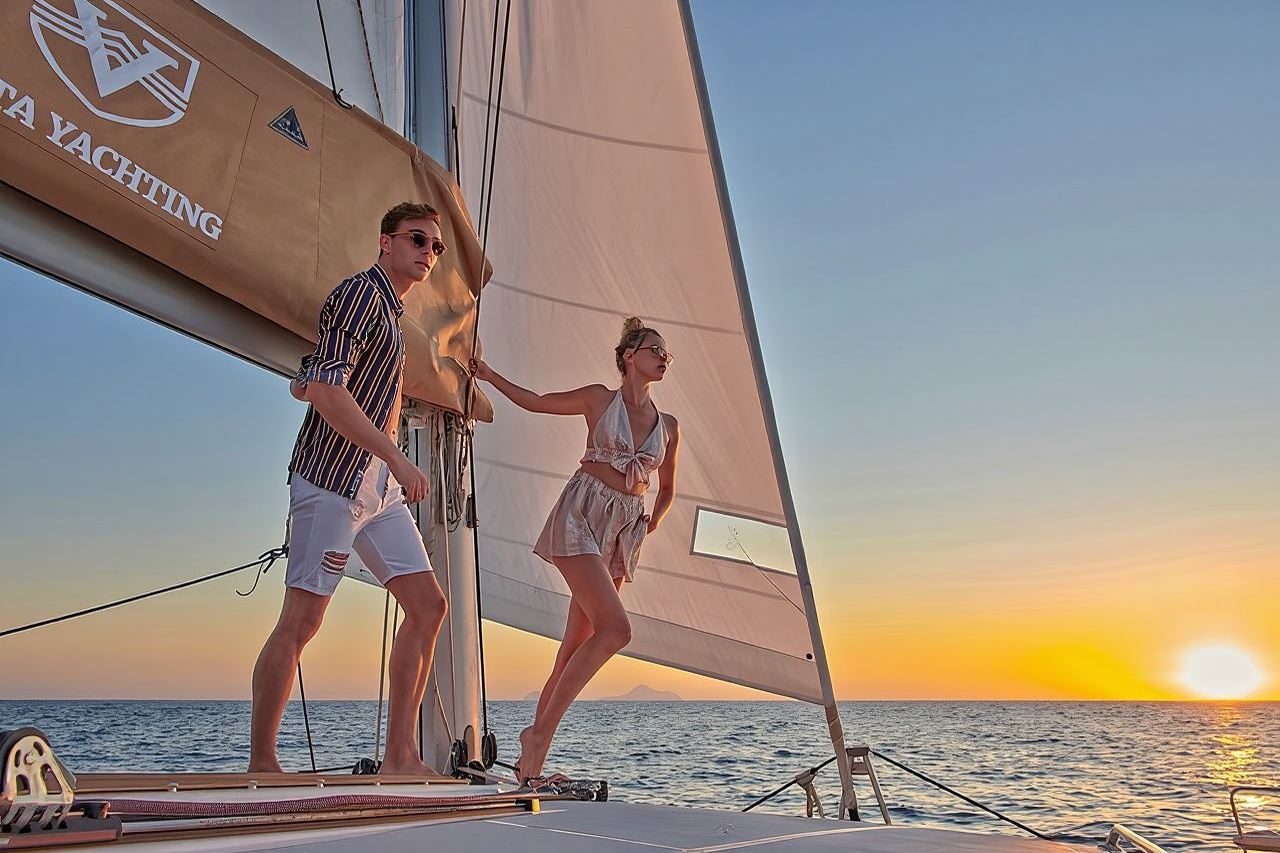 Santorini Gold Catamaran Cruise with BBQ, Drinks and Hotel Pickup