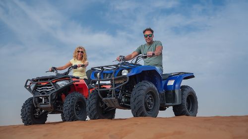 Premium Dubai Red Dunes Quad Bike Tour, Sandboard, Camel & BBQ  Day Tours 5