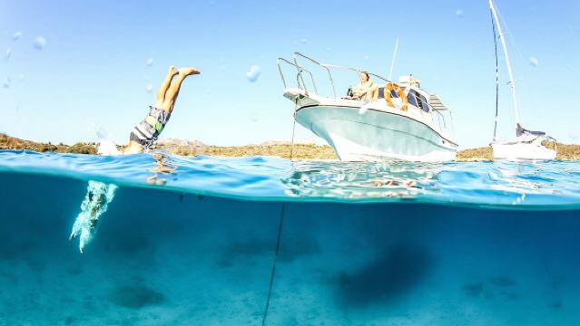 ¡Excursión en barco por Creta con snorkel guiado y recogida gratuita!