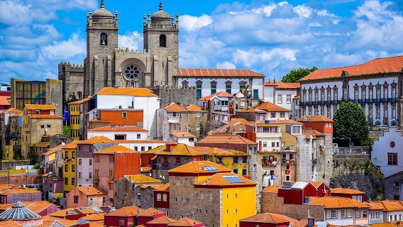 Porto tour by tuk-tuk and port wine cellar guided tour with tastings