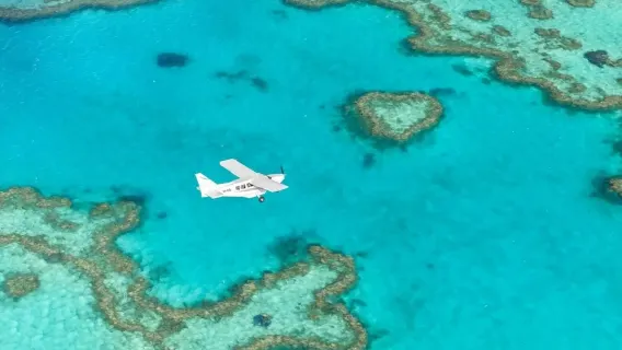 Whitsundays Heart Reef + Whitehaven Beach + Hill Inlet 50–60 min scenic flight (departing from Hamilton Island with pickup available)
