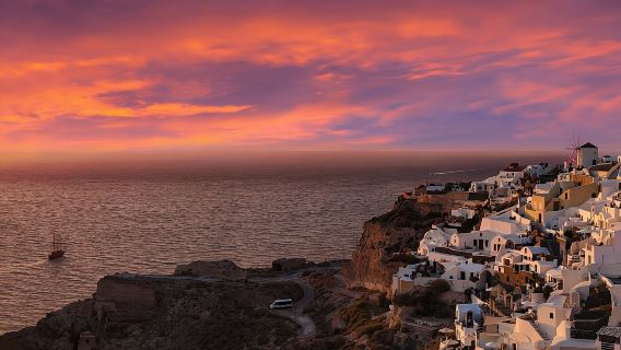 Sunset cruise on a wooden Sailing in the Aegean Sea, Santorini, Greece|Includes buffet on board + multi-area transfers