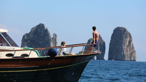 Capri Island and Blue Grotto Half Day Tour|Italian yacht|swimming and snorkeling|drinks and snacks